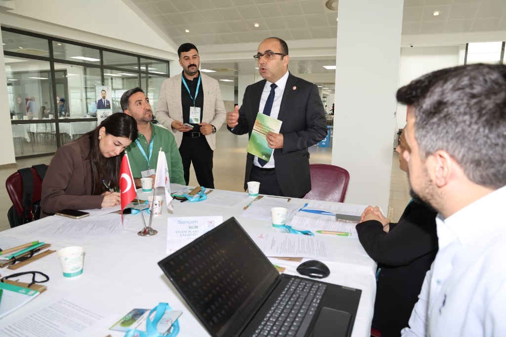 Prof. Dr. Haşim Kelebek demonstrating the Heritage Game application to regional stakeholders in Adana, 22 May 2026