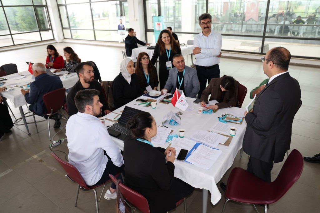 Prof. Dr. Haşim Kelebek demonstrating the Heritage Game application to regional stakeholders in Adana, 22 May 2026