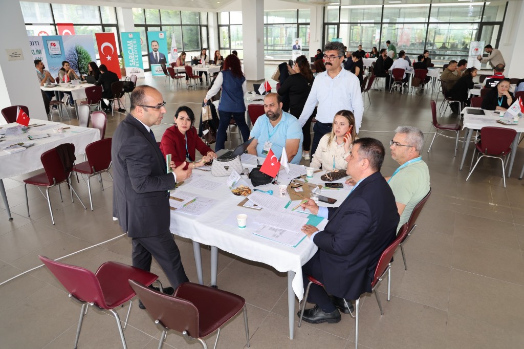 Prof. Dr. Haşim Kelebek demonstrating the Heritage Game application to regional stakeholders in Adana, 22 May 2026