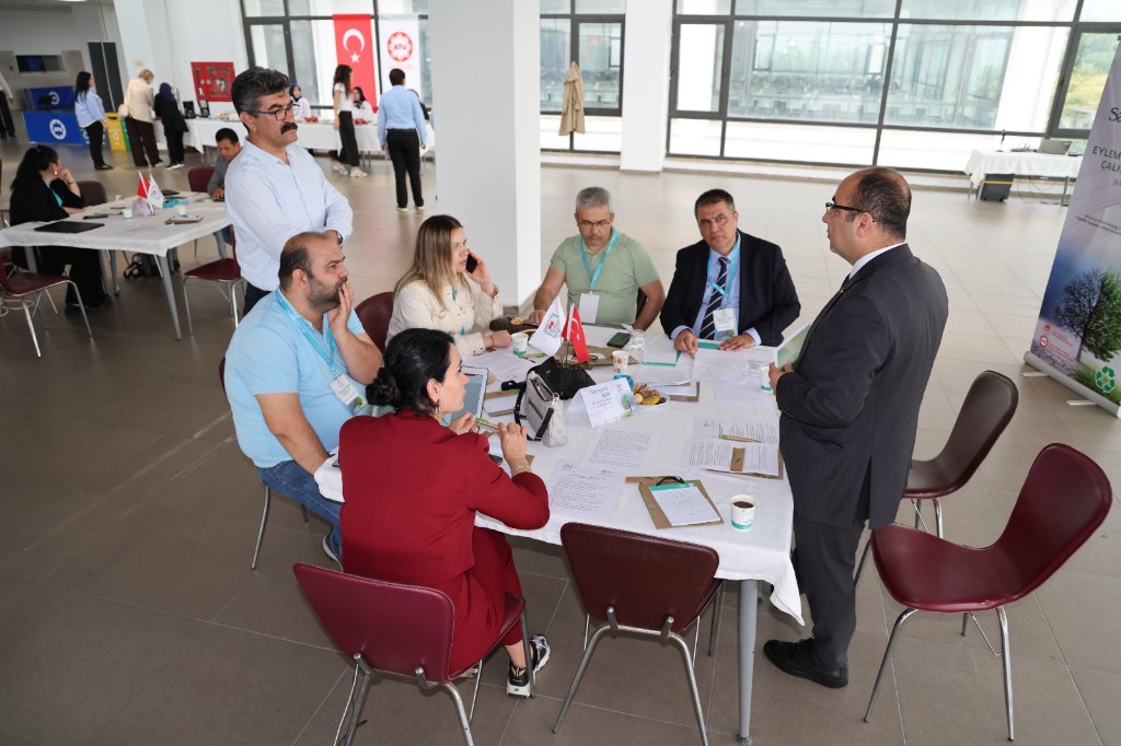 Prof. Dr. Haşim Kelebek demonstrating the Heritage Game application to regional stakeholders in Adana, 22 May 2026